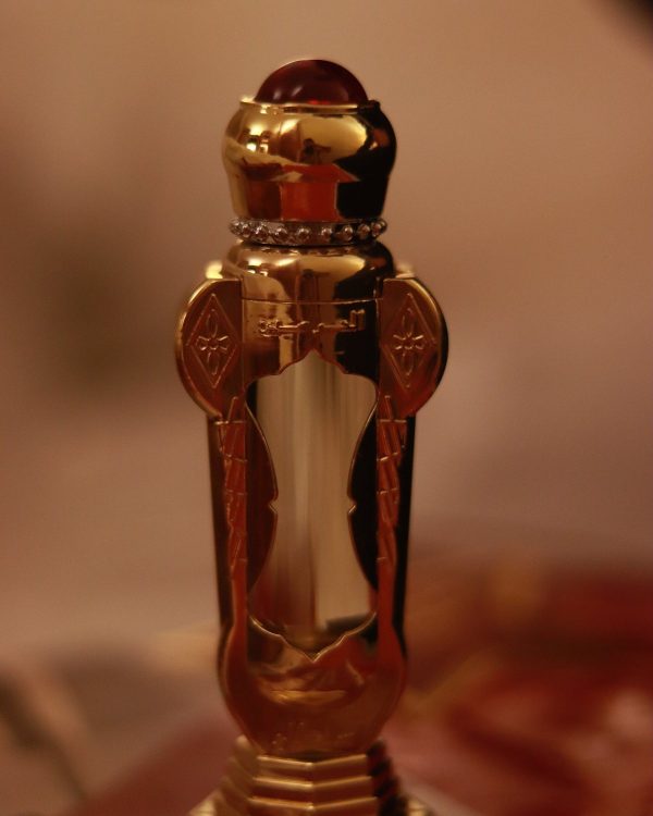 قارورة دهن عطري ذهبية مزخرفة